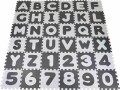 Knorrtoys Puzzlematte Alphabet + Zahlen grau-weiss